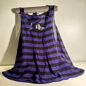 Torrid size 1, with pleats in the front and a keyhole back